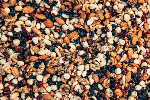 Mixed Nuts Background, Close-Up Nuts, berry fruit, nut - food, textured, background kalender stock pictures, royalty-free photos & images