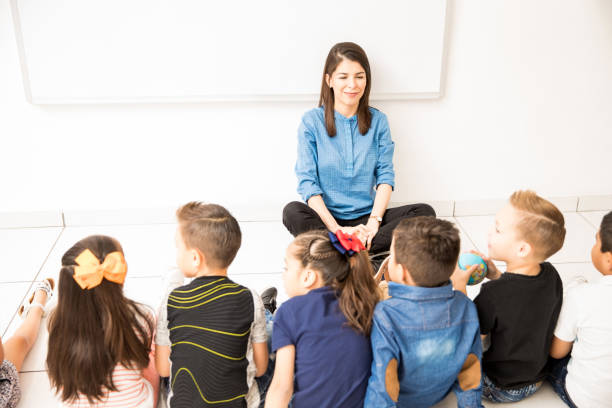 istock Group of students in a preschool classroom 893603272