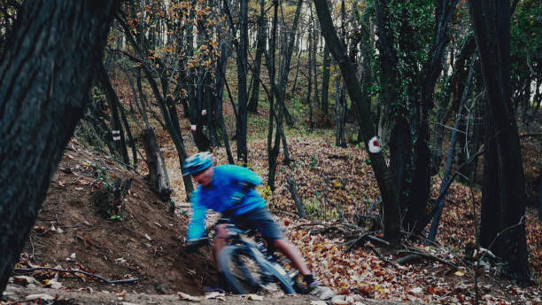 istock Man falling of his bike on a turn 893603452