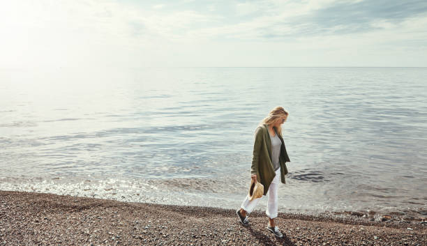 istock Taking a chilled out stroll along the lake 893612382