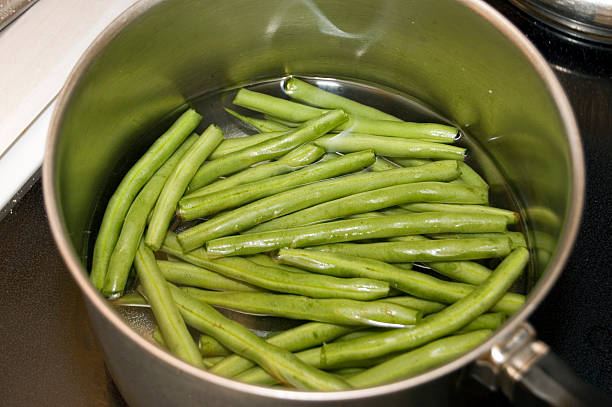 Green Beans Green Beans on the stove. theishkid stock pictures, royalty-free photos & images