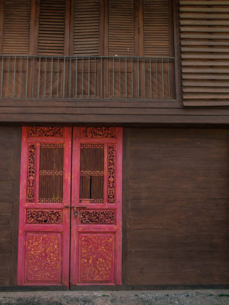 istock red Chinese door in tradition Thai house 893646960