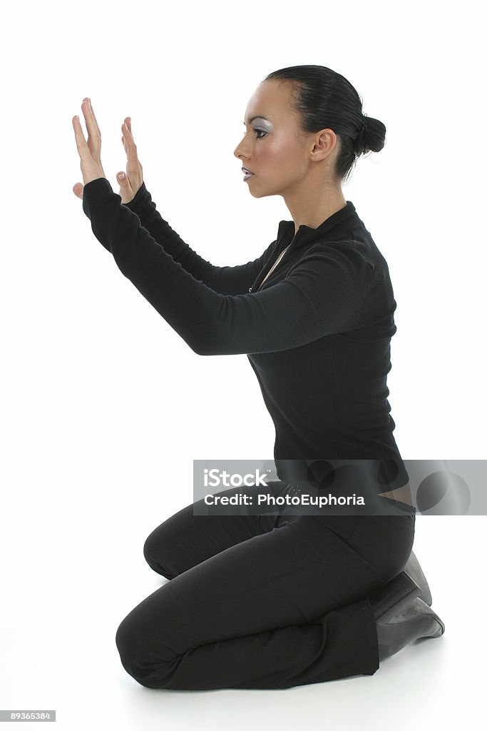 Woman Praying on Floor  Above Stock Photo