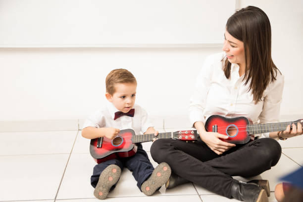 istock Teaching music to a toddler 893716988