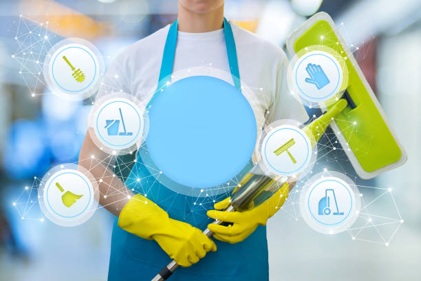 istock Cleaner with cleaning services icons . 893747722