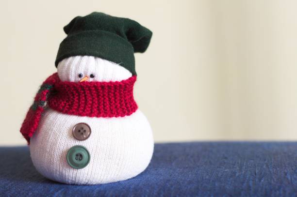 Two toy snowmen - mother and kid