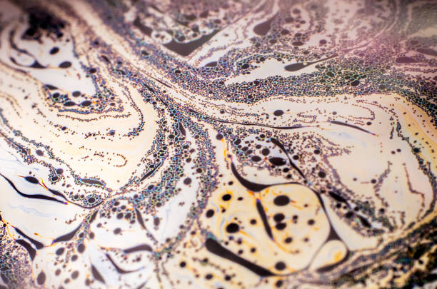istock Beautiful psychedelic abstraction formed by light on the surface of a soap bubble 893805832
