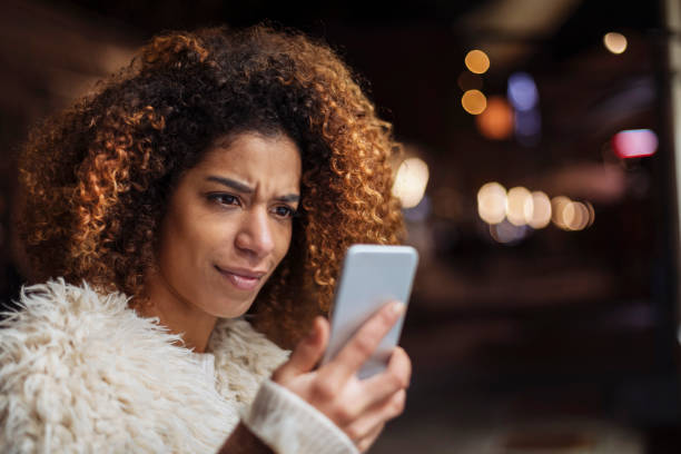 istock African American girl using phone 893852888