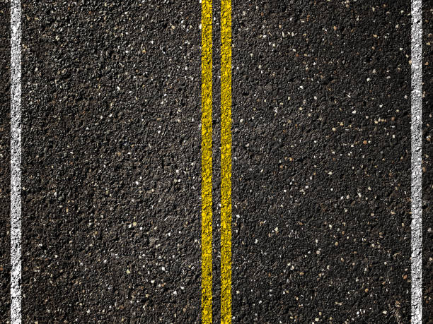 istock Asphalt road with double yellow lines 893873506