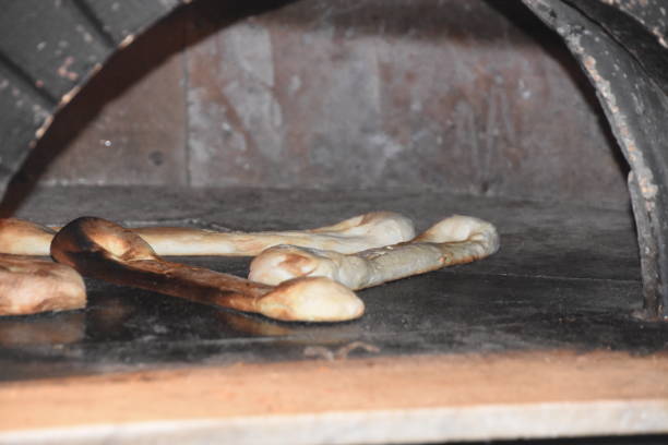 istock Preparation of breads in the oven 893893052
