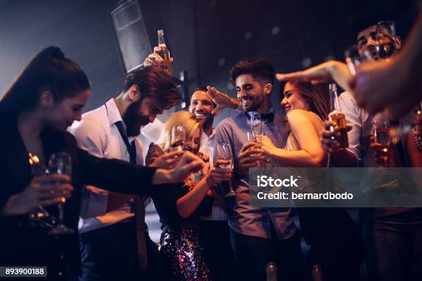 Their Favorite Club To Let Loose Stock Photo - Download Image Now - Christmas, Nightclub, Dancing