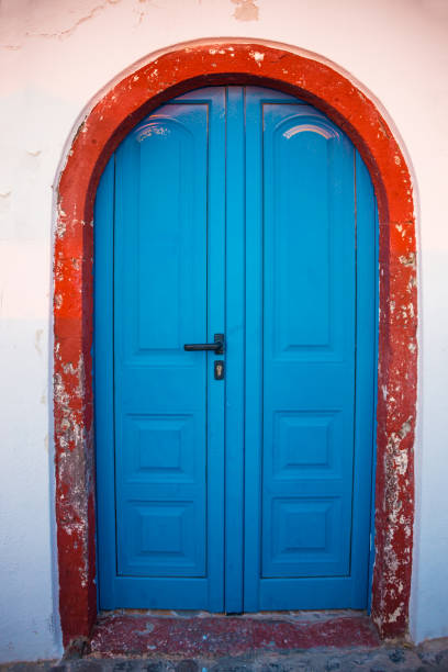 istock Blue door on Santorini island, Greece 893911372