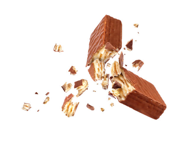 istock Chocolate waffle broken into two parts isolated on white background 893983712