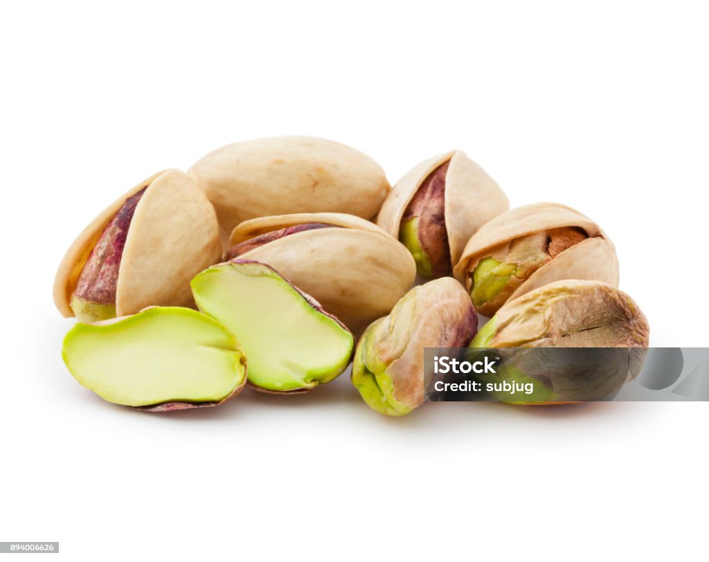Pistachios Raw pistachios isolated on white Pistachio Stock Photo