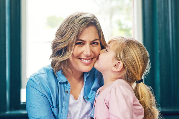 istock Here's a kiss for mommy 894016192