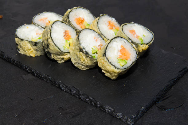 istock Hot Sushi roll with salmon. Japanese food. 3 894019646