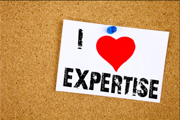istock Hand writing text caption inspiration showing I Love Expertise concept meaning Expert Evaluation Opinion  Loving written on sticky note, reminder isolated background with copy spac 894037308