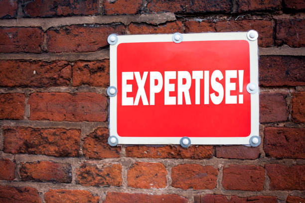 istock Hand writing text caption inspiration showing Expertise concept meaning Expert Evaluation Opinion  written on old announcement road sign with background and copy spac 894040858