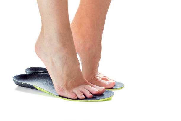 istock feet and orthopedic insoles 894047786