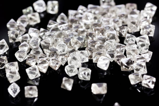 istock natural transparent diamonds in macro on a black background 894058066