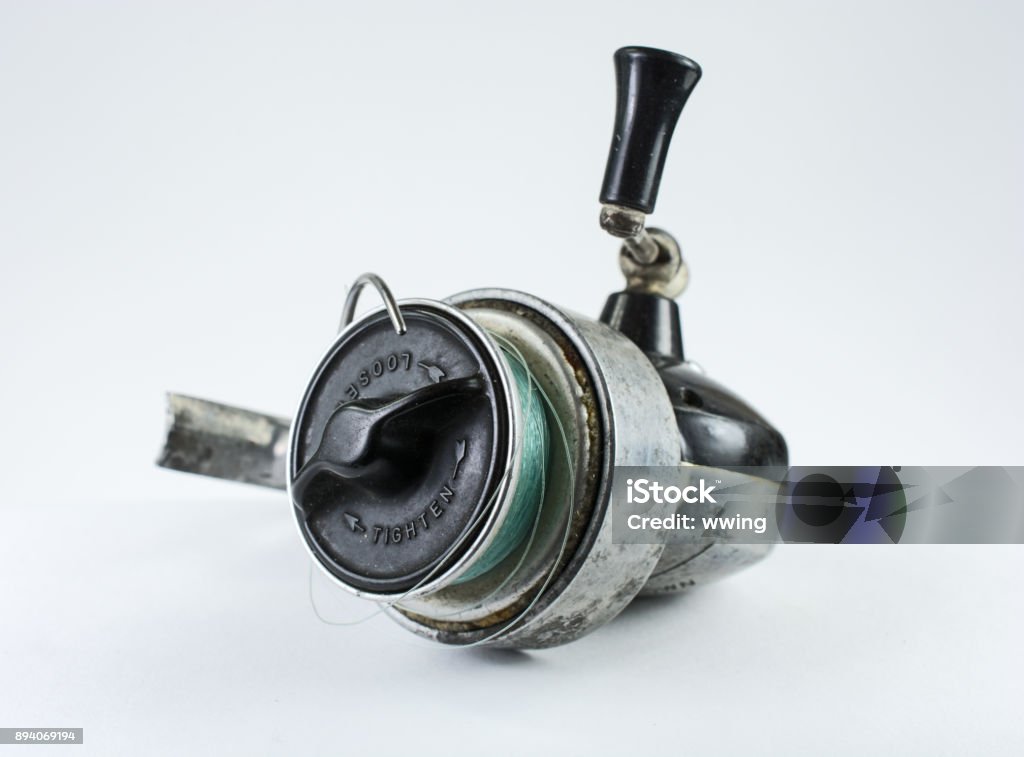 Old Retro Openface Spinning Reel On White Stock Photo - Download