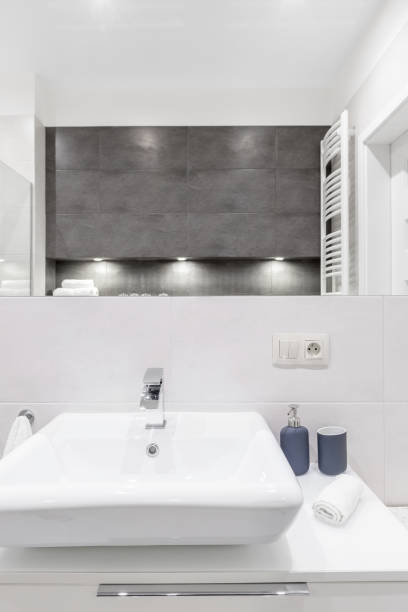 istock Sink and mirror in bathroom 894076566