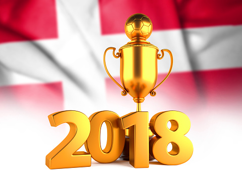 Sport Background with Sport Background with Golden Winner Trophy Cup and 2018 text against the national flag of Denmark