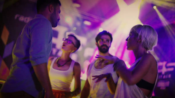 istock People dancing at music festival 894087774