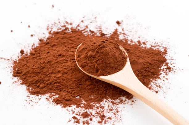 istock cocoa powder and wooden spoon 894091472