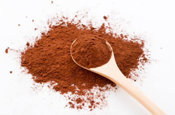 istock cocoa powder and wooden spoon 894091498