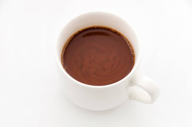 istock Cocoa drink in white mug isolated on white background, 894091532
