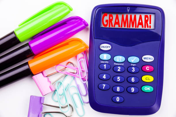 istock Writing word Grammar text in the office with surroundings marker, pen writing on calculator. Business concept for  The Basic Rules of Syntax Grammatical Language white background with copy space 894094790