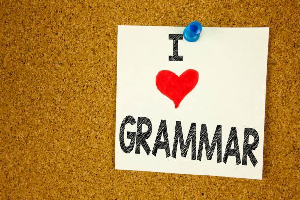 istock Hand writing text caption inspiration showing I Love Grammar concept meaning  The Basic Rules of Syntax Grammatical Language Loving written on sticky note, reminder isolated background with copy space 894097298