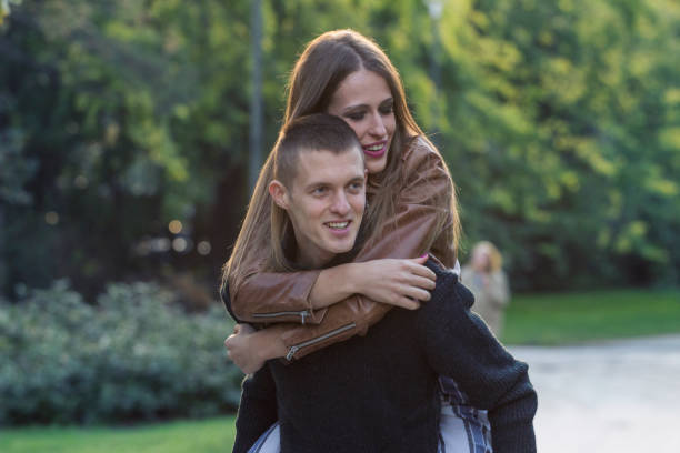 istock Young couple at the park 894101798