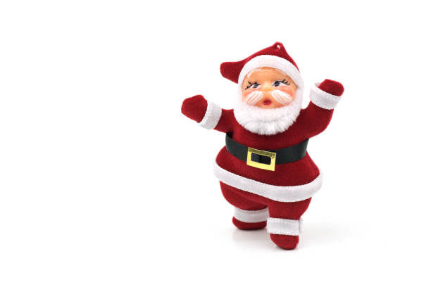 istock santa claus dolls on white background 894101870