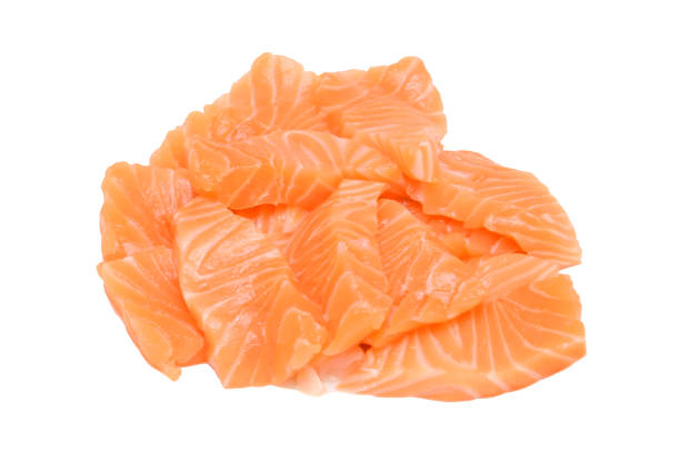 istock Group of Raw Sliced Salmon Isolated on White Background 894104220