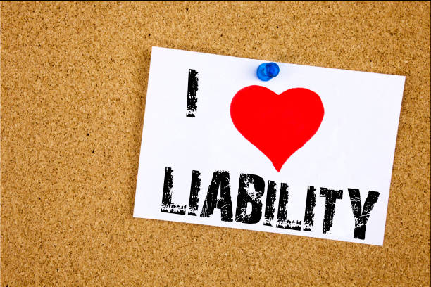 istock Hand writing text caption inspiration showing I Love Liability concept meaning Accountability Legal Blame Risk Loving written on sticky note, reminder isolated background with copy space 894111766