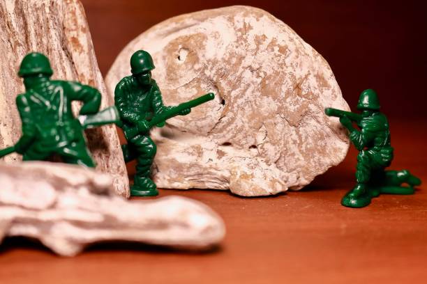 istock Soldiers hiding in the rock 894122582
