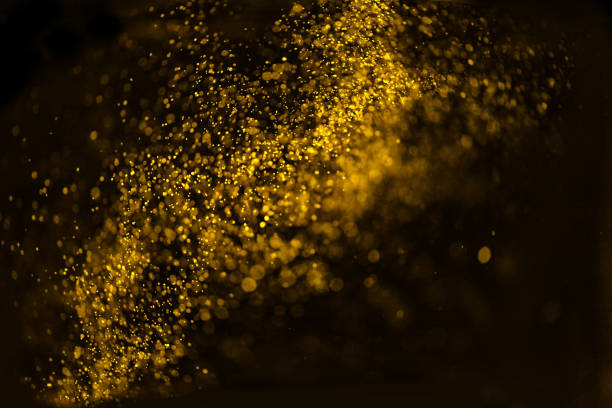 istock golden glitter texture Colorfull Blurred abstract background for birthday, anniversary, wedding, new year eve or Christmas. 894146830