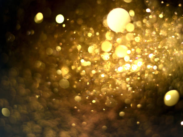 istock golden glitter texture Colorfull Blurred abstract background for birthday, anniversary, wedding, new year eve or Christmas. 894150036