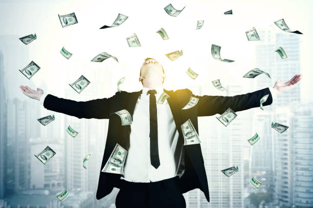 istock Successful businessman with dollar money 894181126