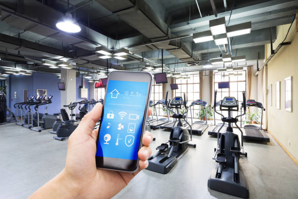 istock smart phone with smart home with modern gym 894186914
