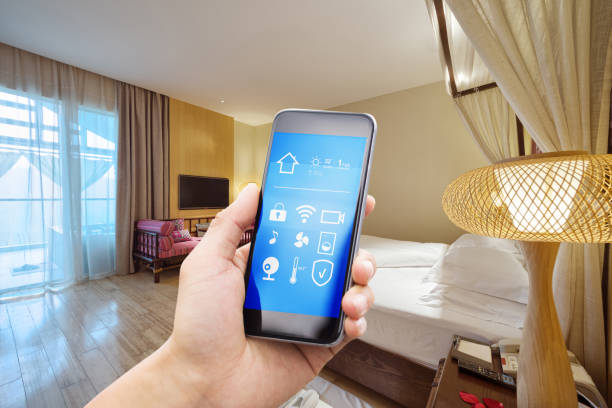 istock smart phone with smart home with modern bathroom 894191914