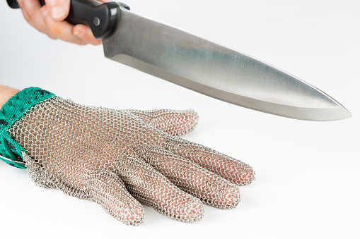 Metal safety mesh glove with a knife