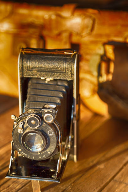 istock Vintage photo camera and suitcase 894203204