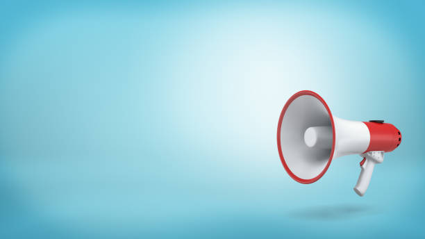 istock 3d rendering of a single red and white electric megaphone with a handle stands on a blue background 894203892