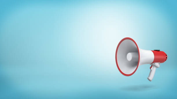 3d rendering of a single red and white electric megaphone with a handle stands on a blue background 3d rendering of a single red and white electric megaphone with a handle stands on a blue background. Public speaking. Crowd control. Grab attention. announcement message stock pictures, royalty-free photos & images
