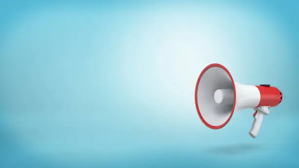 Photo of 3d rendering of a single red and white electric megaphone with a handle stands on a blue background