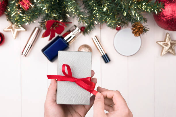 istock Cosmetic products in gift box on wooden background 894214112