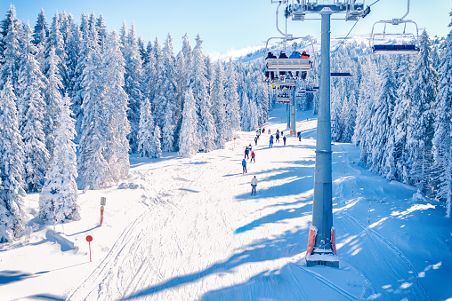 Ski resort Kopaonik, Serbia, lift, slope, people skiing